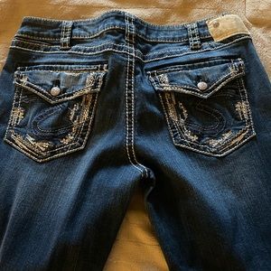 Silver Aiko mid slim boot cut jeans.